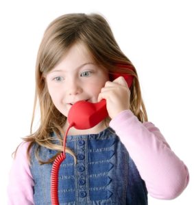 young girl talking on the phone with happy expression isolated on a white background